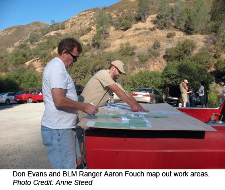 Don-Evans-and-BLM-Ranger-Aaron-Fouch-map-out-work-areas