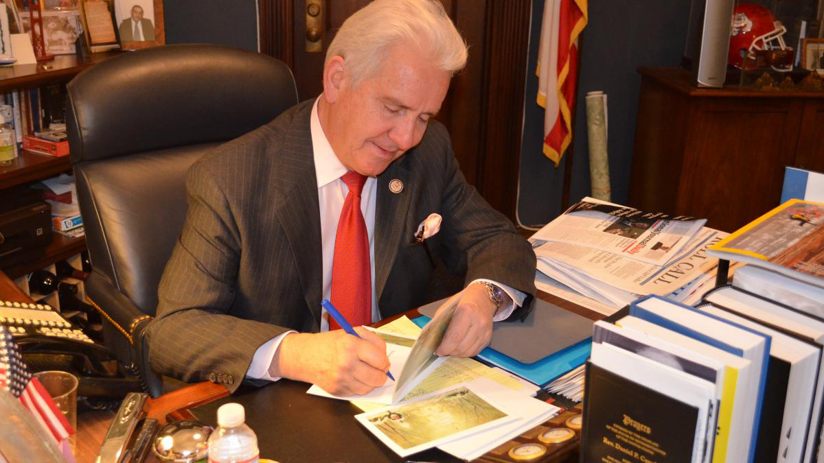 Rep Costa Signing His Holiday Cards During 2012 Drive