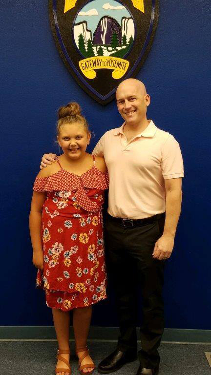 Kayleigh Trindade with Merced Police Department Detective Henderson