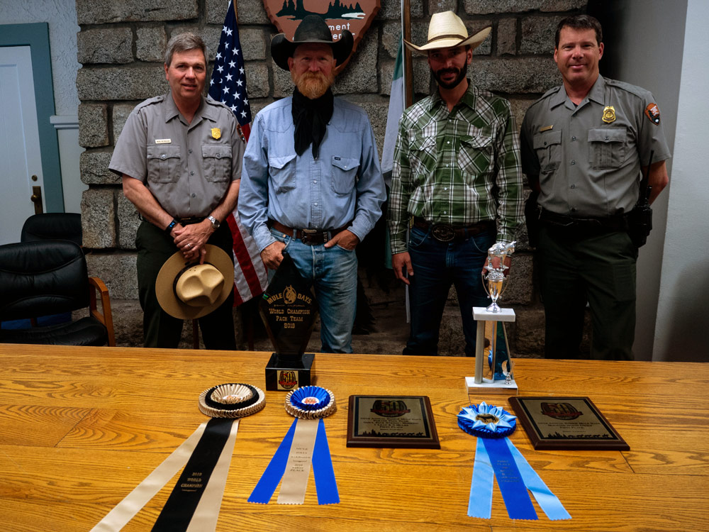 NPS Photo Mule Days Awards Left to Right Superintendednt Michael Reynolds Lead Packer Justin Foust Ranger Clif Ashley Cheif Ranger Kevin Killian